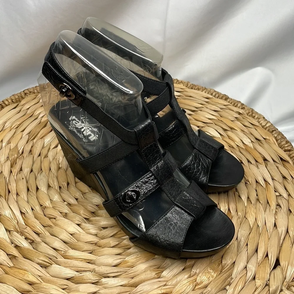 Umberto raffini Signature black, leather, and elastic wedge sandals